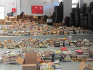 They put all the books in one huge school gym and then we sort through them.  